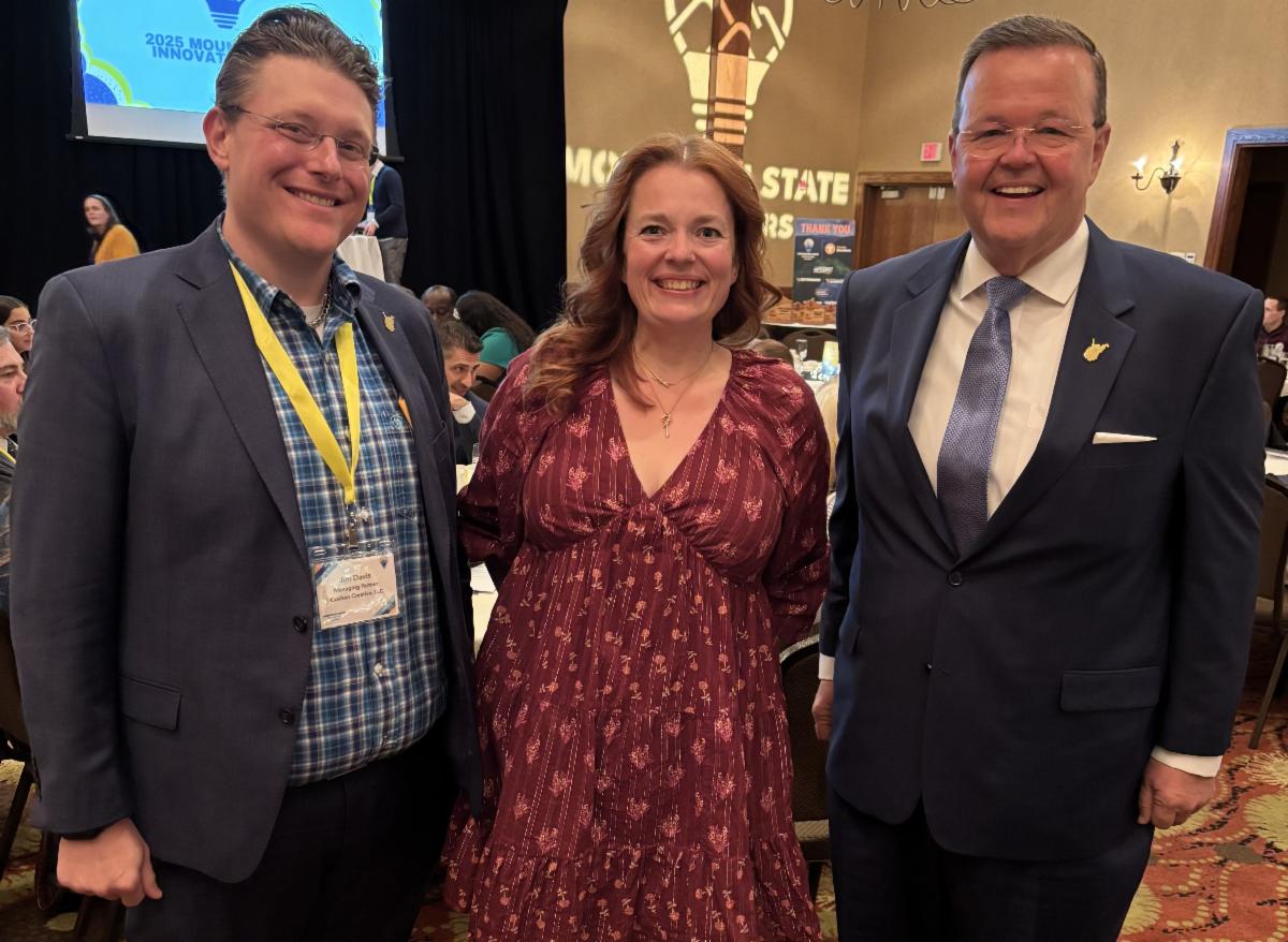 Jim Davis, Christy Hayhurst Davis and Secretary of State Kris Warner