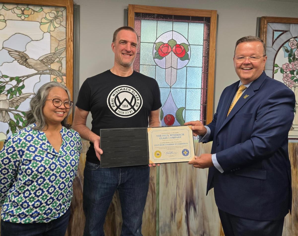 Owner of Paul Wissmach Glass Company Annabelle Javier, Owner of Paul Wissmach Glass Company Jason Wilburn and Secretary of State Kris Warner