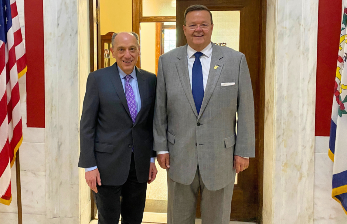 Louis Weisberg, President and CEO of Service Wire, and WV Secretary of State Kris Warner