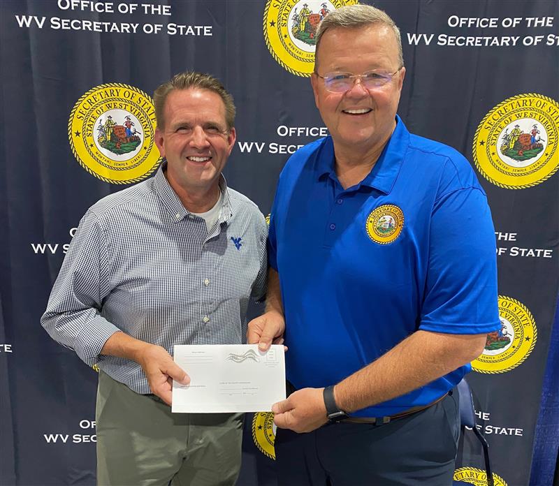 WVU President Michael Benson and WV Secretary of State Kris Warner