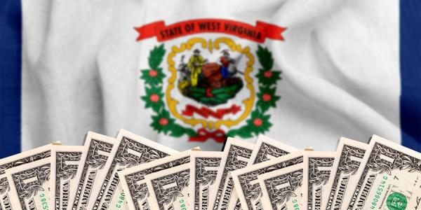 West Virginia State Flag and Dollar Bills